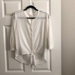 Chico’s off white 3/4 sleeve blouse.  Tie front, hidden buttons.  Chico’s size 0
